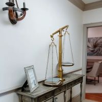 Kam, Ebersbach & Lewis, P.C. ico